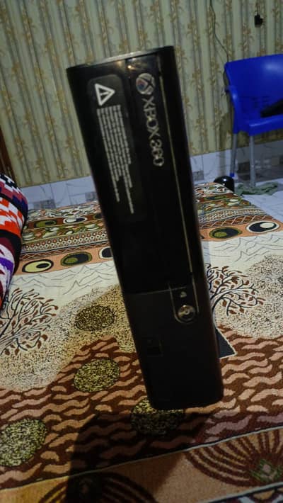 Xbox 360 with two controllers