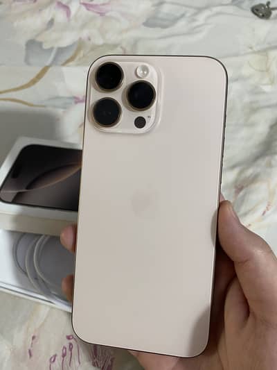 Apple iPhone 16 Pro Max with original adopter