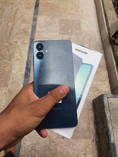 Samsung A06 with box 7 month used
