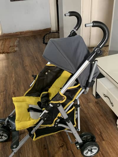 imported light weight pliko brand stroller in excellent condition