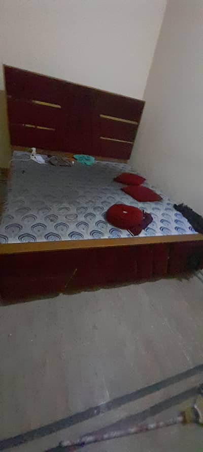 Bed with side tables and dressing
