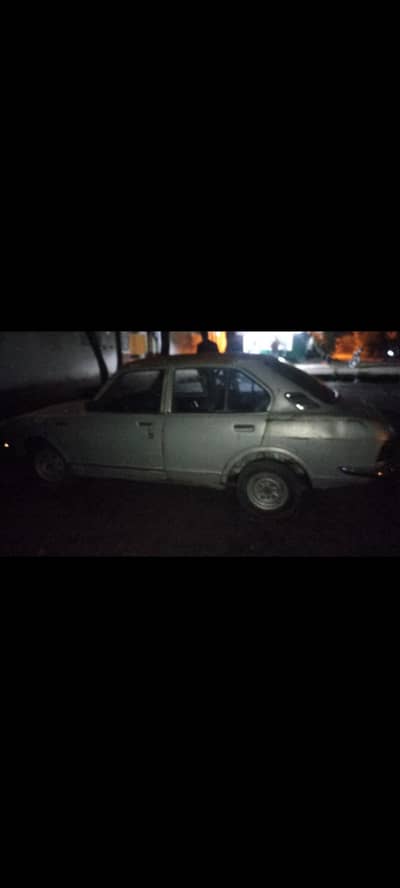 Toyota Corolla 1974 Islamabad num