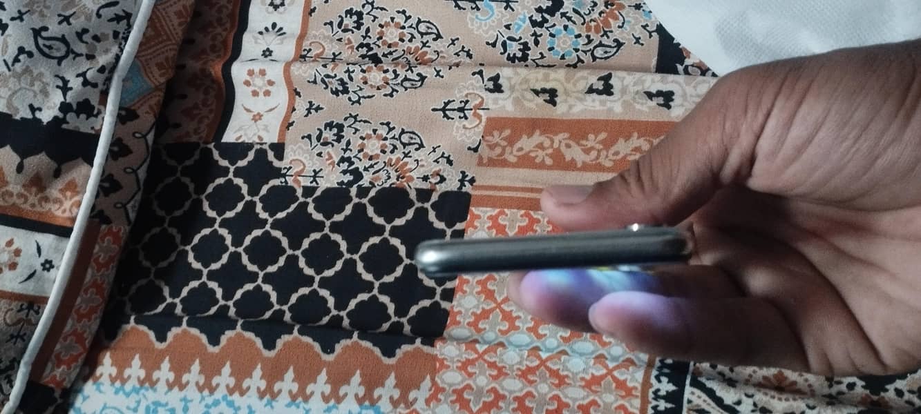 Apple iPhone X back pennal change 2
