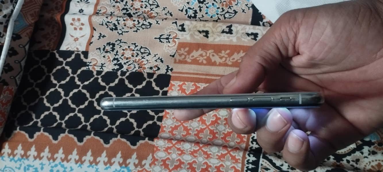 Apple iPhone X back pennal change 3