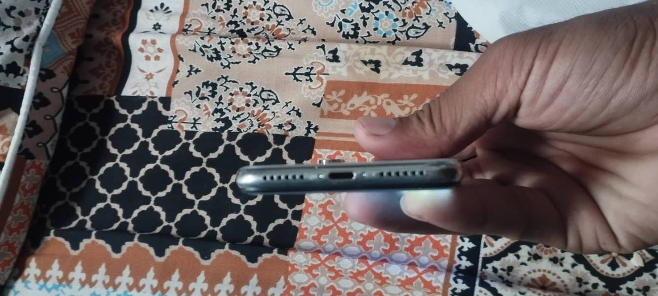 Apple iPhone X back pennal change 4