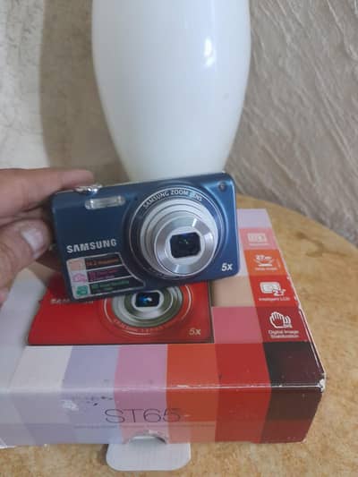 Samsung ST65 digital camera features a 14.2-megapixel Blue color