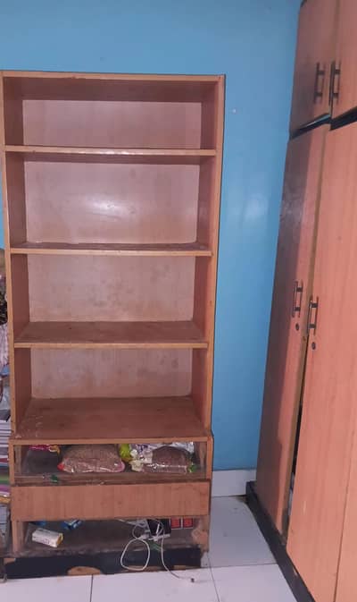 wooden wardrobe and book rake
