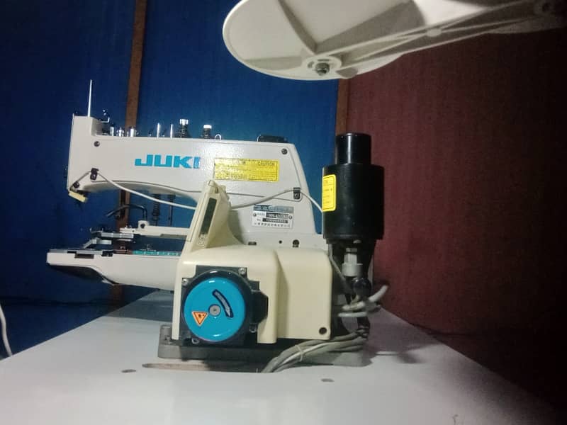 Juki button auto drive machine 1