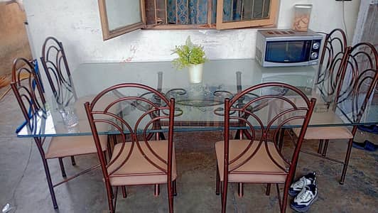 IRON DINNING TABLE FOR URGENT SALE IN LAHORE WITH SIX CHAIRS
