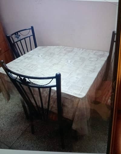 Iron rod dining table with 4 chairs