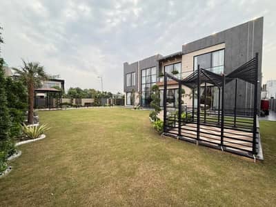 2 KANAL FULL BASEMENT FURNISHED BUNGALOW KANAL LAWN SUPER LUXURY NEAR RAYA TOP LOCATION