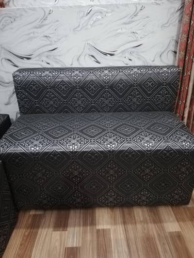 Two Seater Sofa Set with Table and Stools.