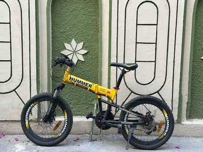Yellow Humber foldable Cycle