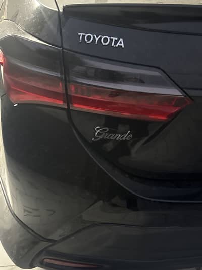 Toyota Altis Grande 2022 attitude black