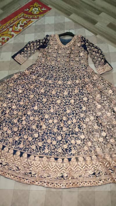 blue maxi . . full golden work . . .