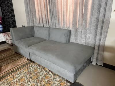 7 seater L shaped sofa in new condition. Soft velvet fabric .