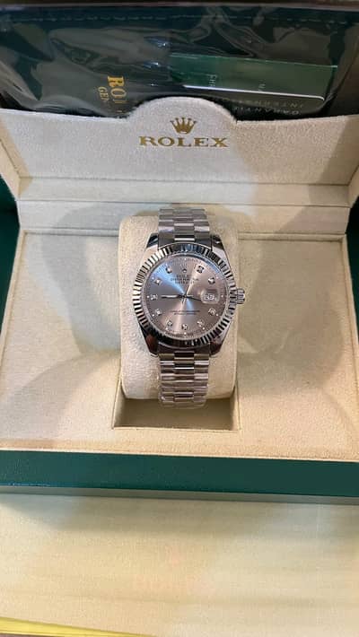 Roolex Silver DateJust with date.