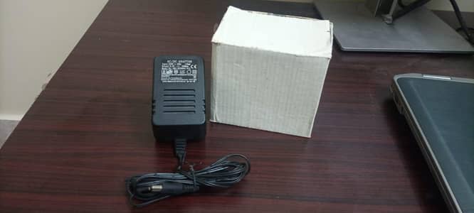 Aztech AC/DC Adaptor, Input of 230V~50Hz, Output of 9.0V DC at 1000mA