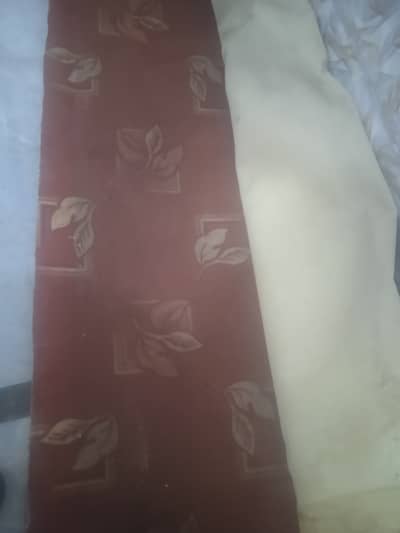 Used synthetic carpet, good design, red color is for sale