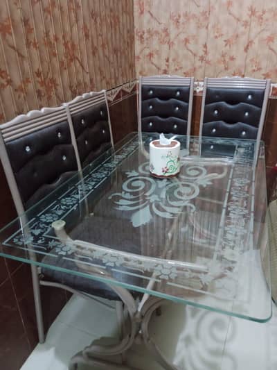 1 Table with Glass and 4 Chairs