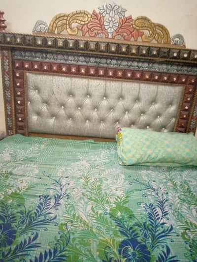 king size bed with dressing and side table