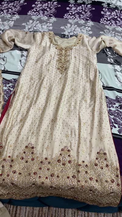 cream Heavy Embroided 3 piece party wear suit stitched.