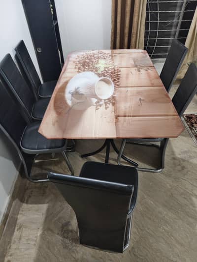6 seater dining table (glass top with metal frame body)