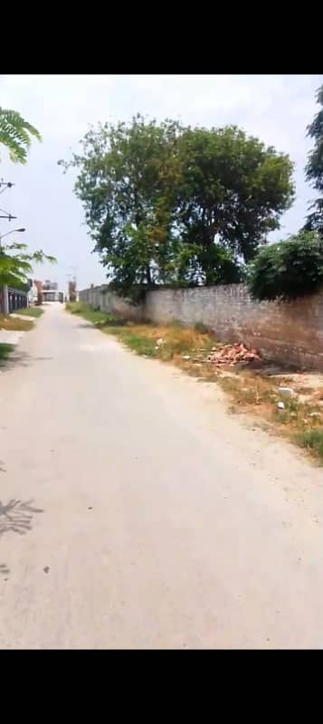 MIAN ESTATE OFFERS CORNER 10 KANAL PLOT WITH BOUNDARY WALL AVAILABLE FOR SALE NEAR PINE AVENUE ROAD T&T society