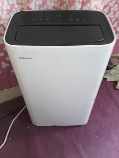 1 Ton Portable AC.   12,000 BTU