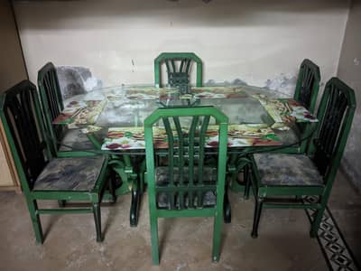 Full dining table with 6 chairs.