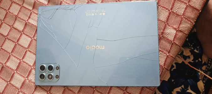 Modio m28 tablet back glass brack urgent for sale