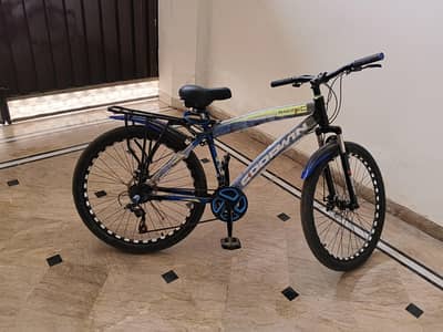 bicycle size 26 inch  blue color with back carear 10/10 condition