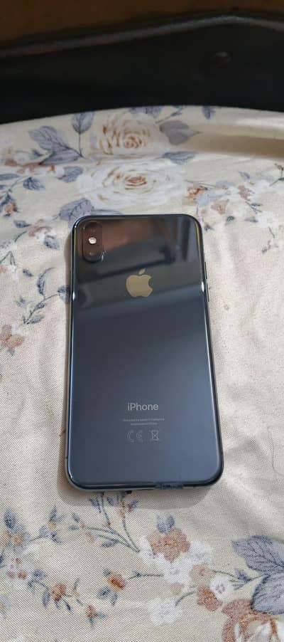 Apple iPhone XS with original charger and cable