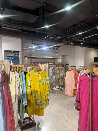 Already Rented Shop Available For Sale In Running Mall, (50,000) Rent Incoming From Day 1.