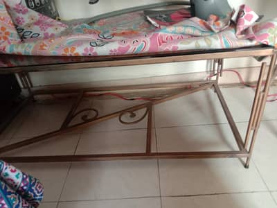 Table . iron rods and top mirror