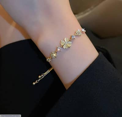 Golden plated flower charm bracelet for women