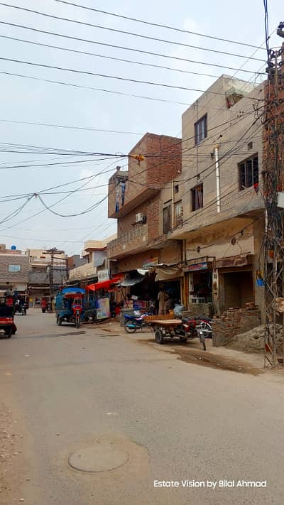 0321 8610688 corner ki commercial property sale 3 shops k oper double story flat bana hova 2 electric meter 2room 2 bath