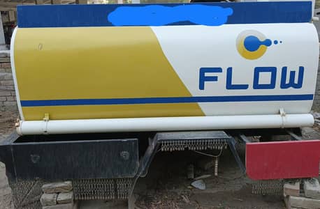 2000 litre tank with machine
