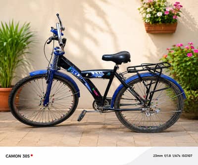cycle  , Colour black + blue, rear carrier , condition good