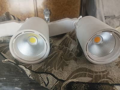 spot lights 8 pieces 1200 each 2 months used