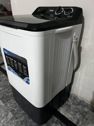 Haier washing machine with complete packaging + box