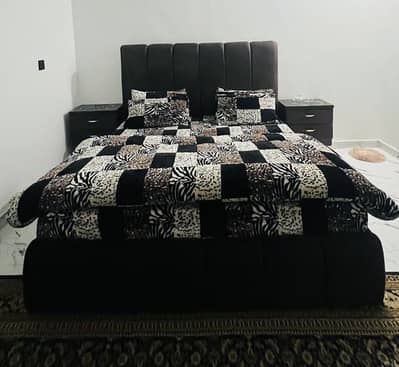 Bed with side tables and dressing table