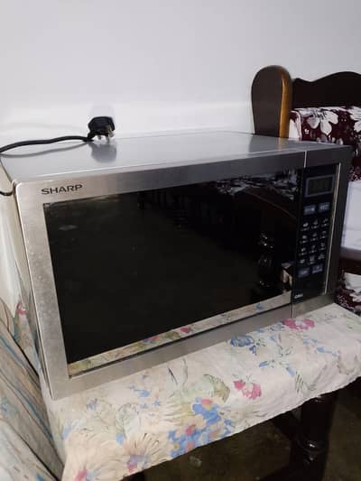 sharp 34 liter grill microwave oven  brand new untouched