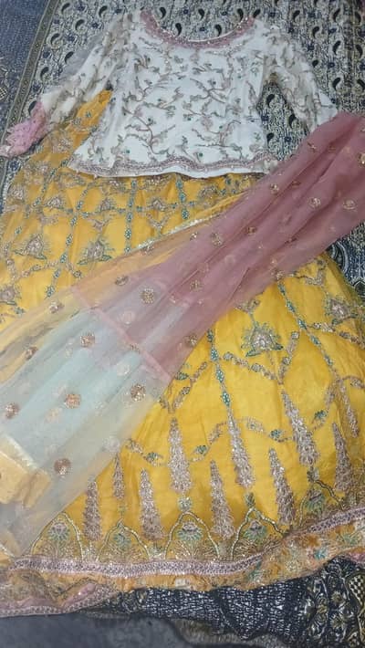 Lehnga shaposh brand white and yellow colour with postal dupata