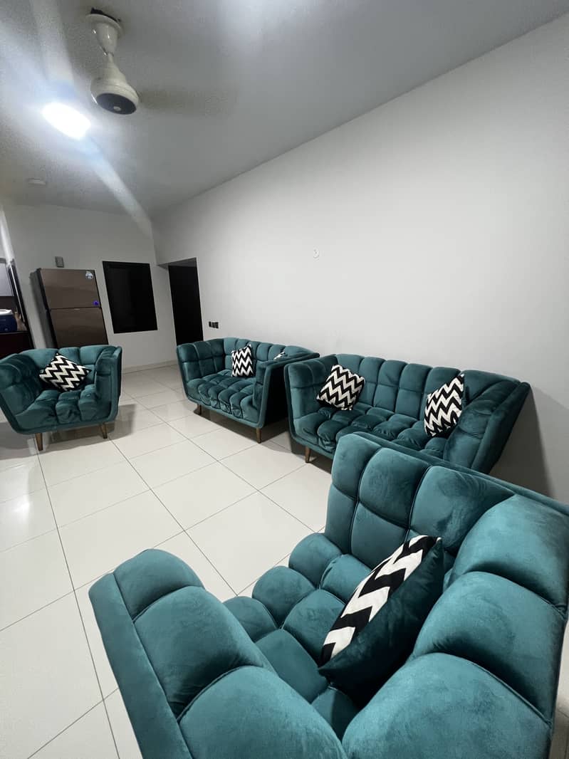 PEACOCK GREEN SOFAS 1