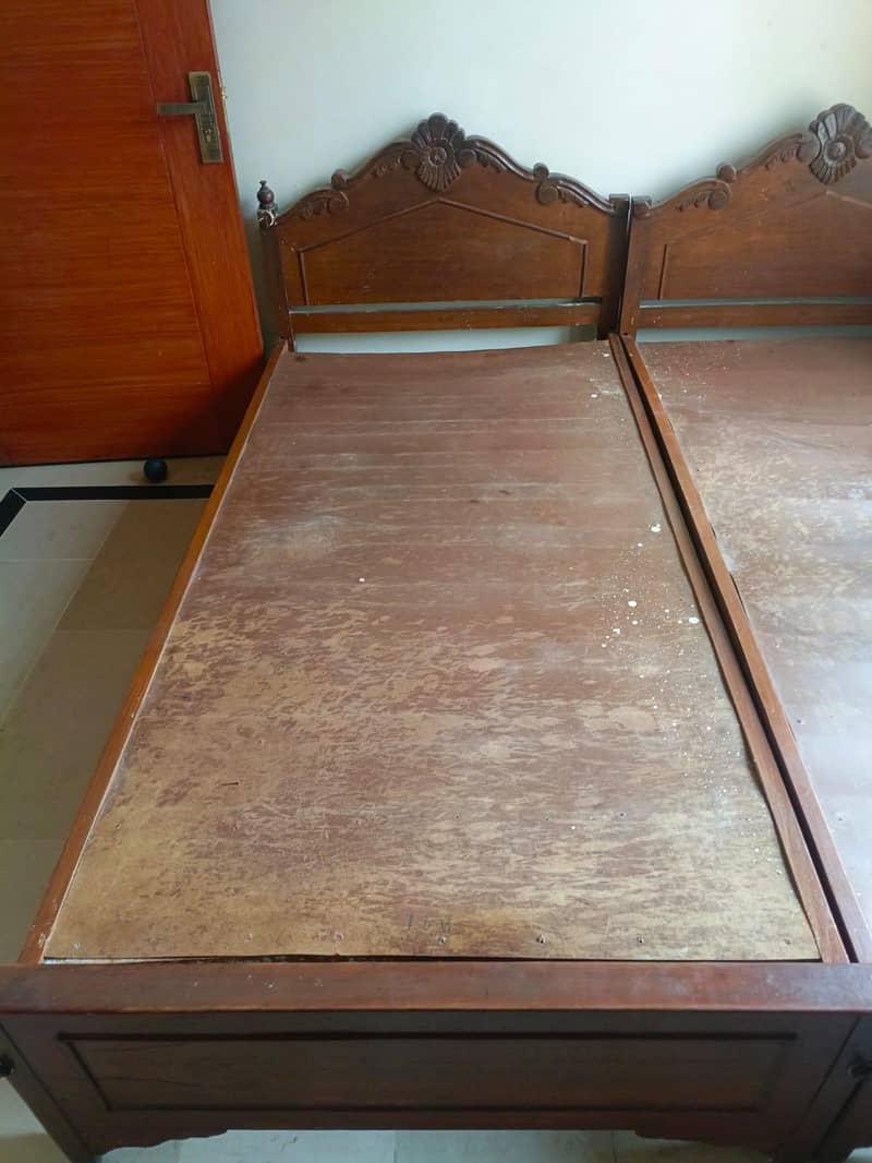 solid wooden 2 single beds 1