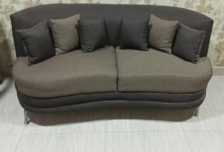 slightly used two seater sofa in excellent condition looks like new