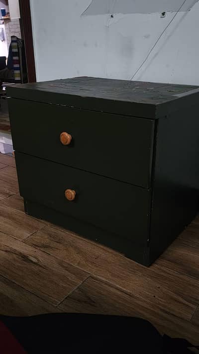 Olive green     in color good condition queen size  side table  and dr
