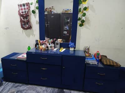 bed , dressing , side table