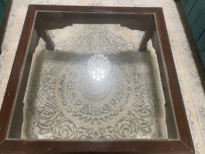 A high quality wooden table set of three.